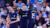 Nkunku inflates blue balloon to celebrate goal in Chelsea's 2-1 win at Brighton in Premier League