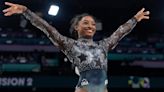 Simone Biles shakes off leg injury to dominate during Olympic gymnastics qualifying