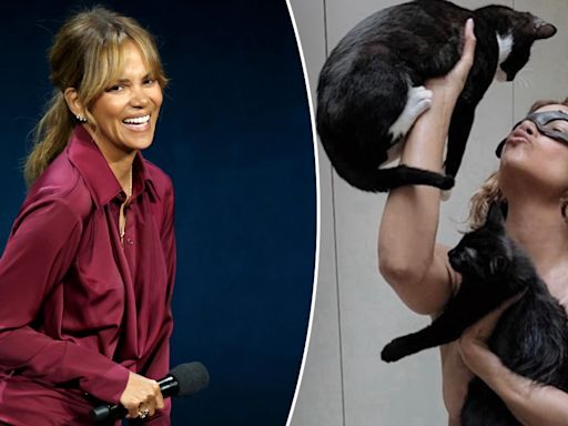 Halle Berry poses topless with her cats to celebrate 20th anniversary of 'Catwoman'