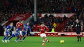 Soccer-Ten-man Brighton back to winning ways with victory at Forest