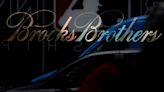 Berkshire's Brooks running unit settles trademark case against Brooks Brothers