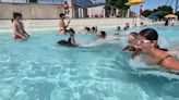 Dozens of kids splash at Wildwater Kingdom for World's Largest swim lesson