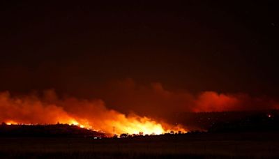 California wildfire explodes, becomes largest in US