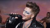 Adam Lambert Saves Himself (& Everyone Else) in Glamorous ‘Holding Out for a Hero’ Video: Watch
