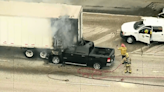 Truck pinned under big rig in fiery crash on Los Angeles County freeway