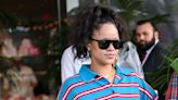 Rihanna Shows Off Baby Bump While Carrying Son In Crop Top and Multi-Colored Jacket