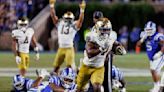 Estime and Hartman help No. 11 Notre Dame push past No. 17 Duke for 21-14 road win