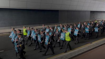 Hundreds of Aer Lingus pilots march around Dublin Airport as eight-hour strike gets underway