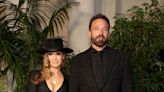Jennifer Lopez Paired a Cowboy Hat with a Plunging Pinstripe Dress