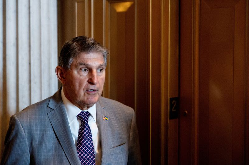 US Sen. Manchin says he's encouraging industry to sue Treasury over EV tax credits