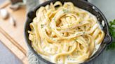 Toss Homemade Pasta With Flour For A Thicker Alfredo Sauce