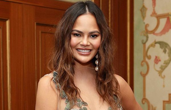 Chrissy Teigen Covers 'SI Swimsuit' in Barely There One-Piece 10 Years After Her Last Sexy Appearance