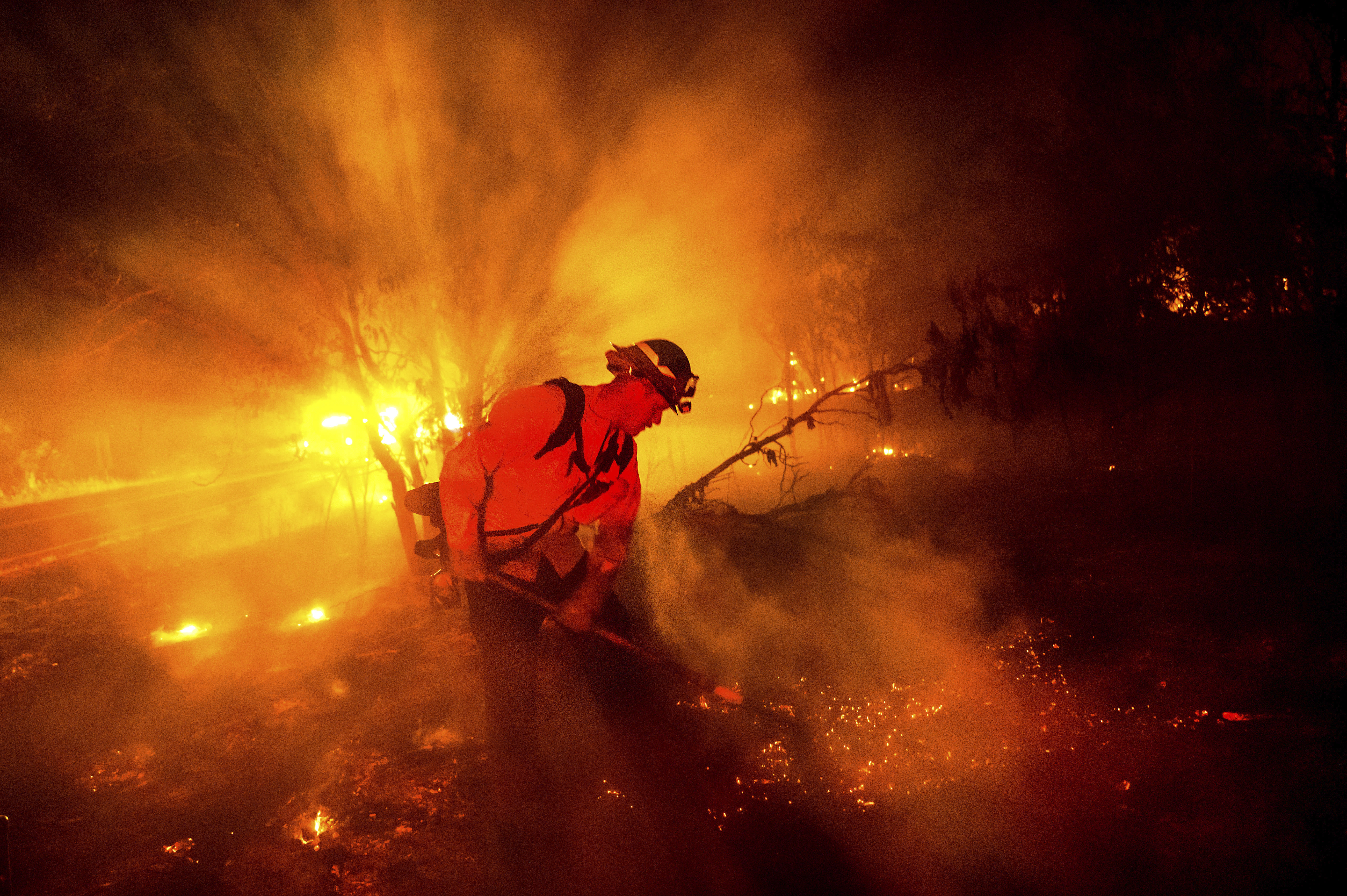 Firefighters gain ground against Southern California wildfire but face dry, windy weather