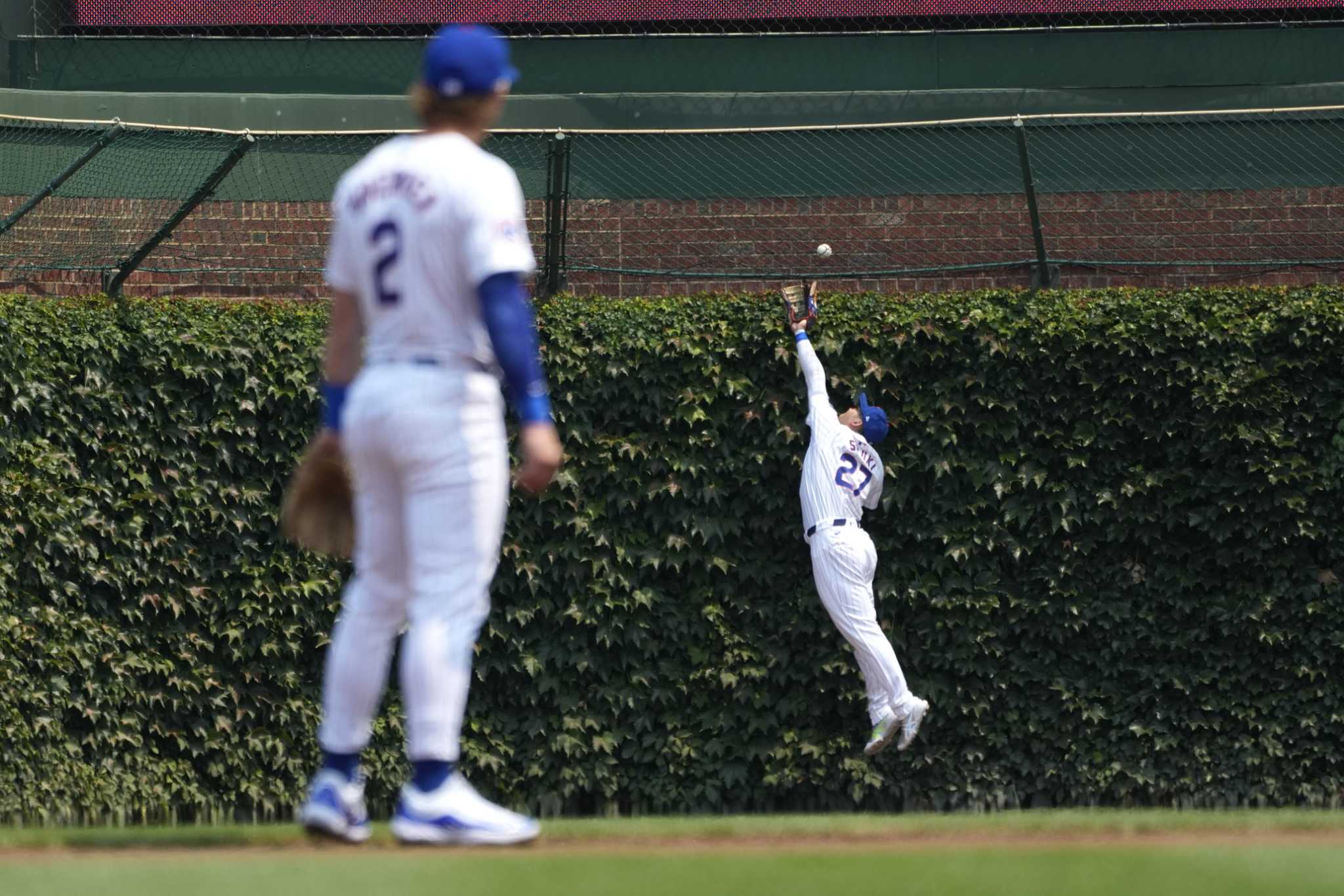 Cubs' eighth-inning fielding mix-up allows Cardinals to rally for 5-4 win