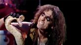 Watch Alice Cooper and his writhing snake lift Billion Dollar Babies to psychotic new heights