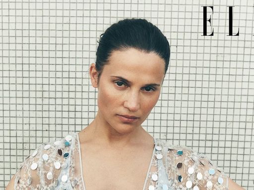 Alicia Vikander wows in a grey bra in a striking shoot for ELLE UK