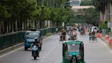 Bangladesh factories, banks reopen as curfew is eased after protests taper off