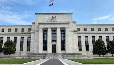 Fed officials see inflation falling, signal no rush to cut rates - ET BFSI