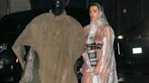 Bianca Censori poses completely nude under see-through raincoat alongside Kanye