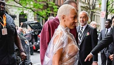 Doja Cat Arrives at Hotel Ahead of Met Gala Nearly Naked Under a Plastic Bag