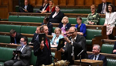 What happens at MPs' swearing in and what is the oath of allegiance?