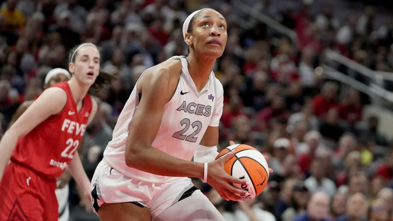 A’ja Wilson breaks WNBA single-season scoring record in Las Vegas Aces win over Caitlin Clark and the Indiana Fever | CNN