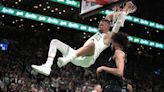 HAPPY RETURN: Porzingis helps Celtics rout Mavs in Game 1