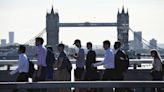 Strong UK pay growth puts interest rate cut path at risk