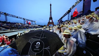 Rain puts a dampener on the Paris Olympics opening ceremony down the River Seine