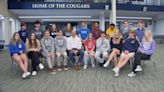 12 sets of twins and 1 set of triplets just graduated from the same high school