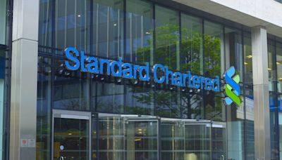 Standard Chartered unveils largest share buyback as profits lift