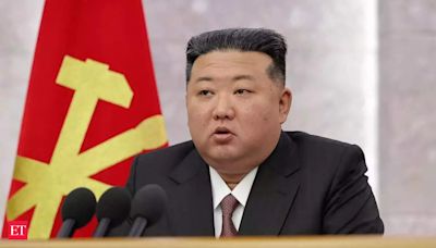 North Korean officials sport Kim Jong Un pins for first time