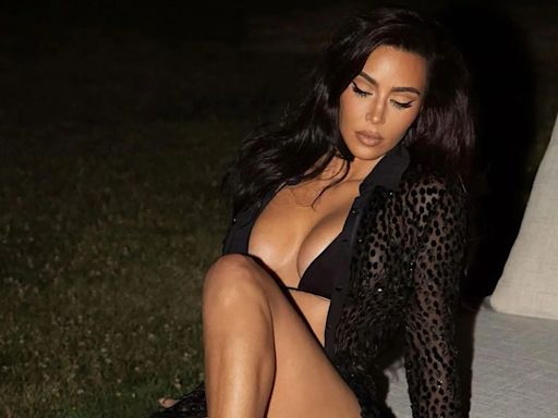 Kim Kardashian, 43, shows off her famous curves in black bikini & matching top