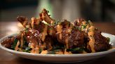 Enjoy duck wings and a wall of self-serve beers at Rivertown Taps