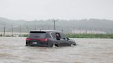 Kim Jong-un surveys massive flooding in North Korea from his Lexus as 5,000 rescued