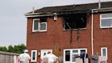 Two young women dead and four hurt as blaze rips through home with pair arrested