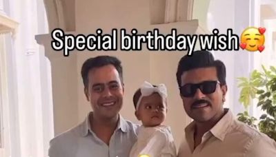 Baby girl can't take her eyes off Ram Charan in adorable video. Watch