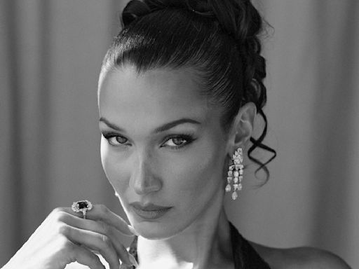 Bella Hadid Gets Ready for ‘Beating Hearts’ Cannes Red Carpet in Chopard and Versace (Exclusive Photos)