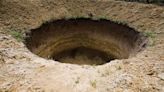 US: 100-foot wide sinkhole gulps portion of soccer field in Illinois