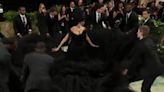 Cardi B brings Met Gala red carpet to standstill as entourage fan out incredible dress