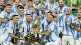 Martinez steps in with winner after injured Messi limps out: Champions Argentina raise the bar with hat-trick of titles