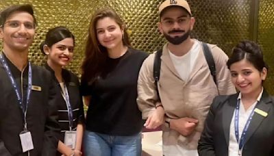 Anushka Sharma-Virat Kohli happily pose with Mumbai airport staff as they jet off for T20 World Cup; PIC