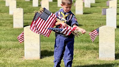 Scouts honor veterans ahead of Memorial Day at Dayton National Cemetery