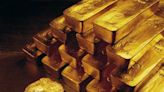 El precio del oro retrocedió tras alcanzar un máximo histórico