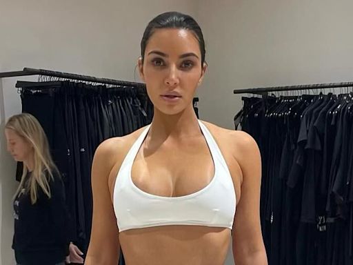 Kim Kardashian shows off her abs sizzling wardrobe fitting