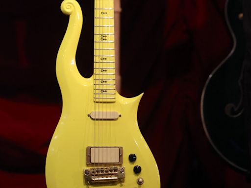 John Lennon's acoustic guitar sells for an eye-watering £1.5m
