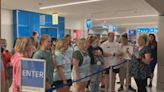 ‘Moment of peace’: Choir brings joy to Charlotte Douglas with song amid flight delays