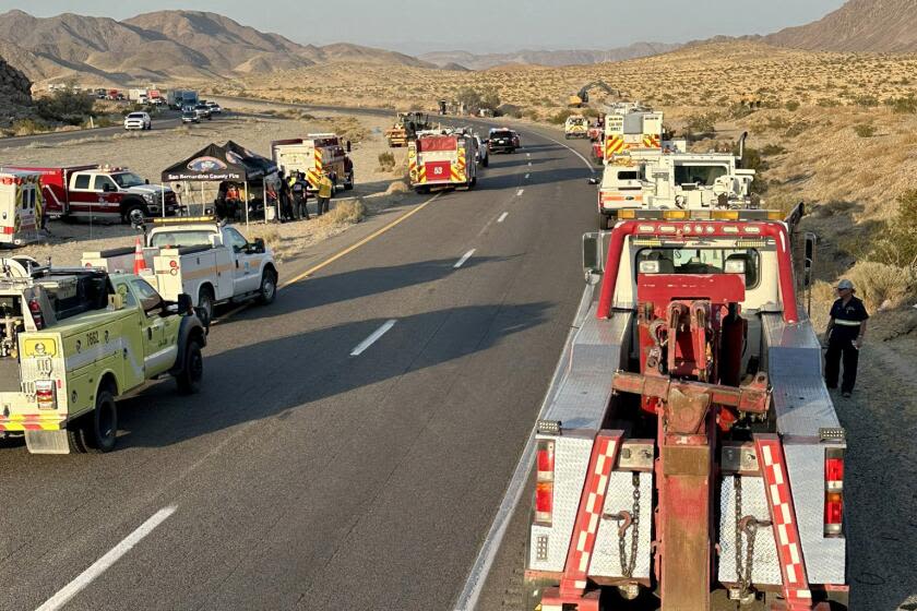 Hazmat cleanup of fiery wreck with ion batteries closes the 15 to Las Vegas, jamming freeways