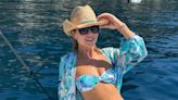 Amanda Holden shows off her incredible figure in a strapless bikini