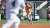 Paul Halfacre talks with Francis Howell senior Alex Bryan and junior Braden Ray after the Vikings defeated Fort Zumwalt West on Tuesday afternoon